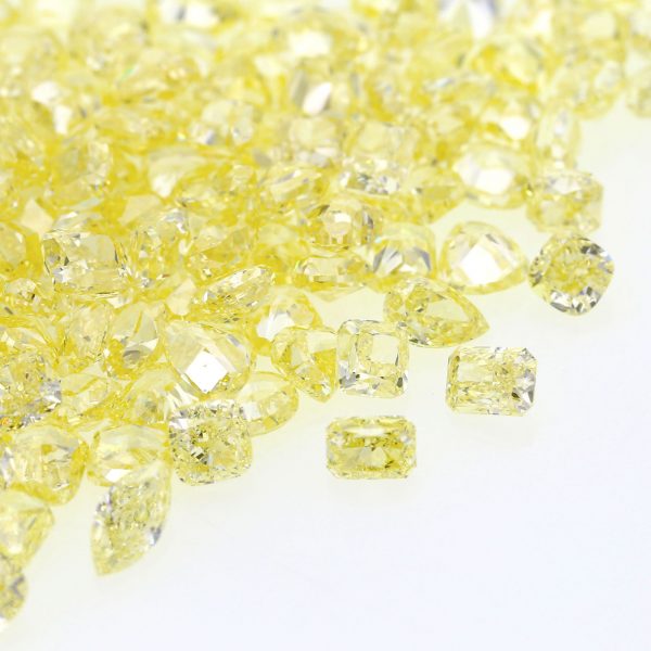 Natural Fancy Light Yellow Fancy shape diamond 0.50 ct and 0.95 ct sizes. VVS-VS